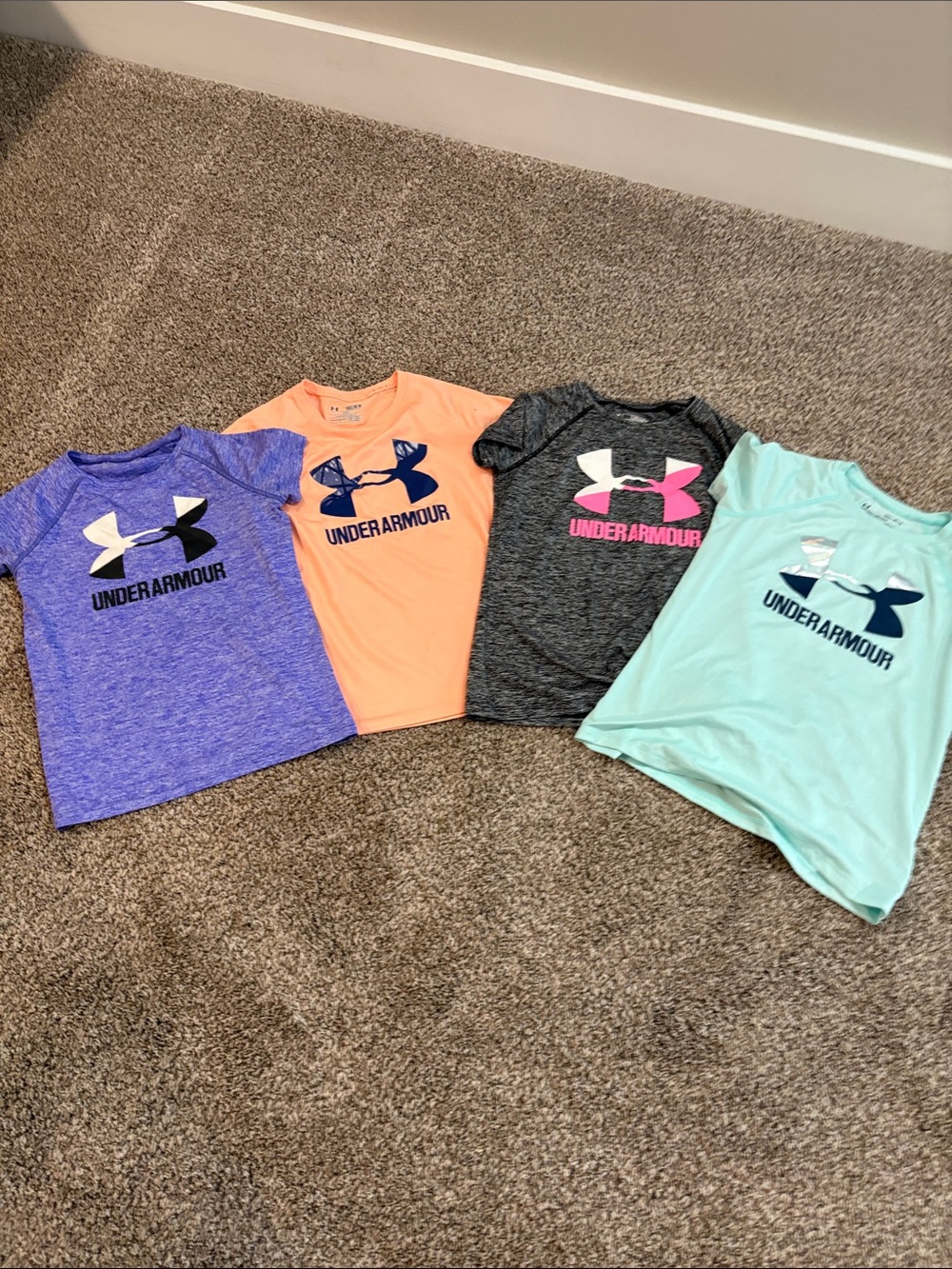 4 girls youth Med Under Armour Short Sleeve Tees - Purple, Peach, Charcoal, Mint